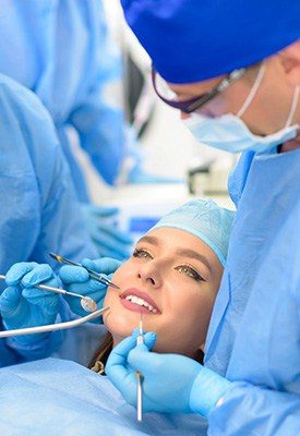 A woman getting oral surgery near Winchester